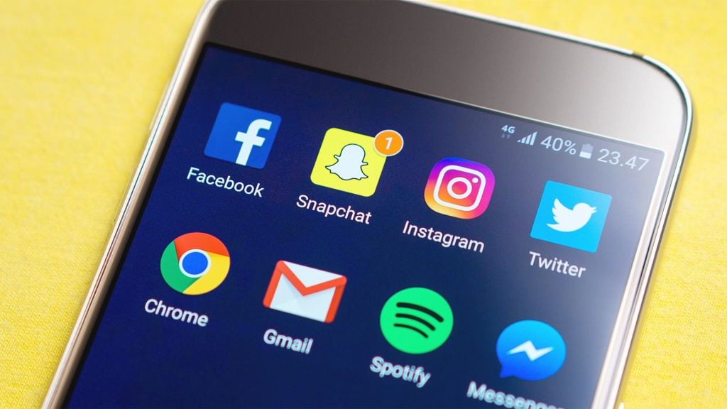Iphone with social media app icons